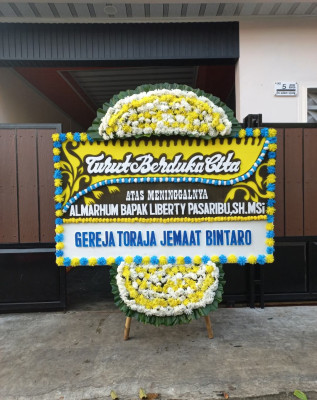 Papan Bunga Duka di Baleharjo